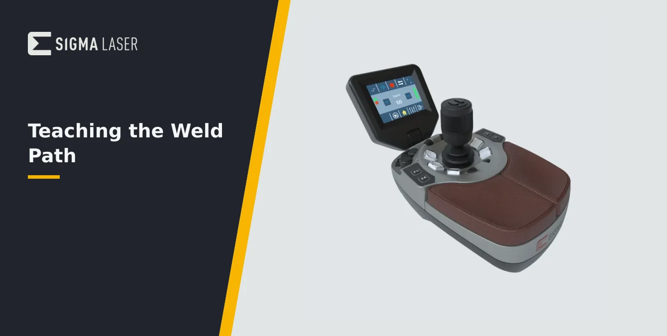 Close-up of hands operating a joystick controller with a yellow grip on a dark industrial workbench, with polished metal fixture and weld samples in background SigoMax joystick controller for teaching the weld path